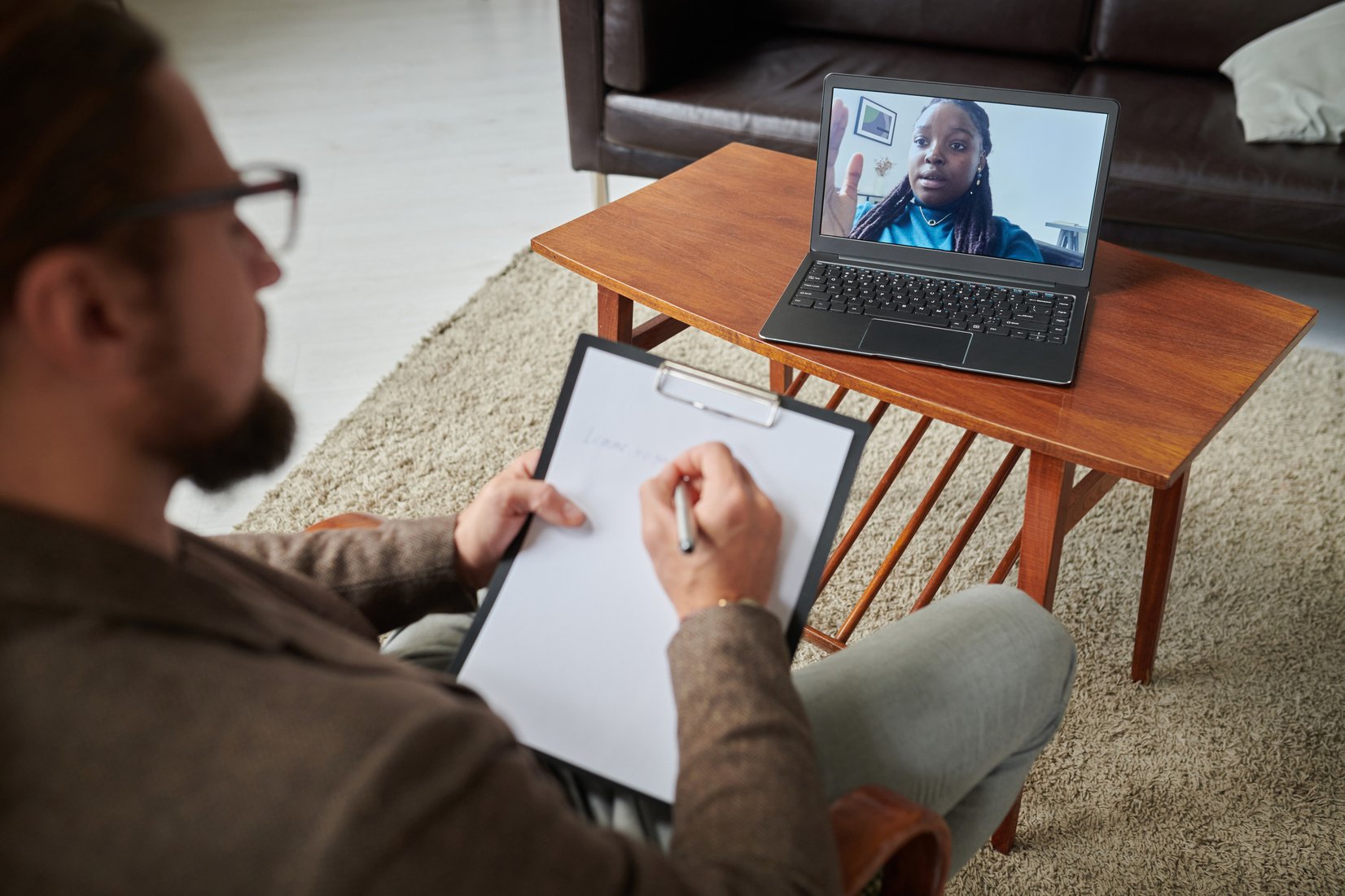 Online Psychotherapy Session on Laptop